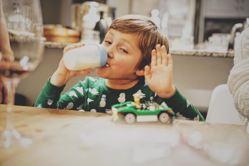 Kid drinking milk christmas pajamas